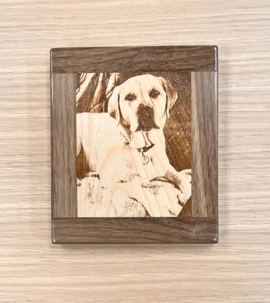 Custom wood pet portrait of Buddy, laser engraved from a customer photo